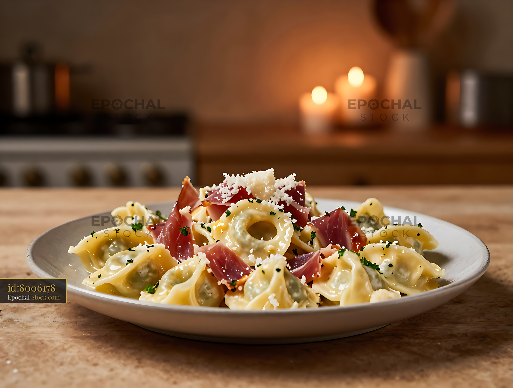 Tortellini panna e prosciutto served on a rustic wooden table - stock photo