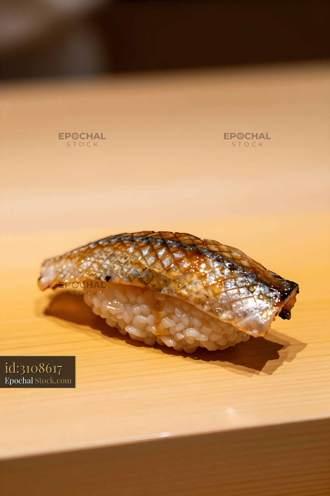 Traditional konoshiro nigiri sushi served on a wooden board - stock photo
