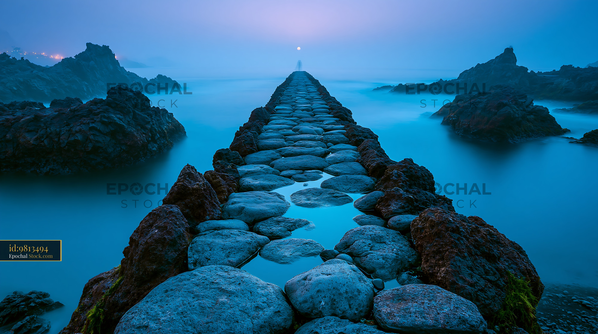 Stone pier leading into the misty ocean at Los Cancajos La Palma - stock photo