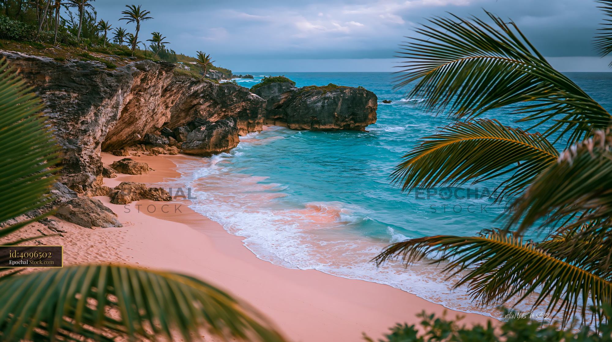 Pristine tropical beach with pink sand and turquoise water - stock photo