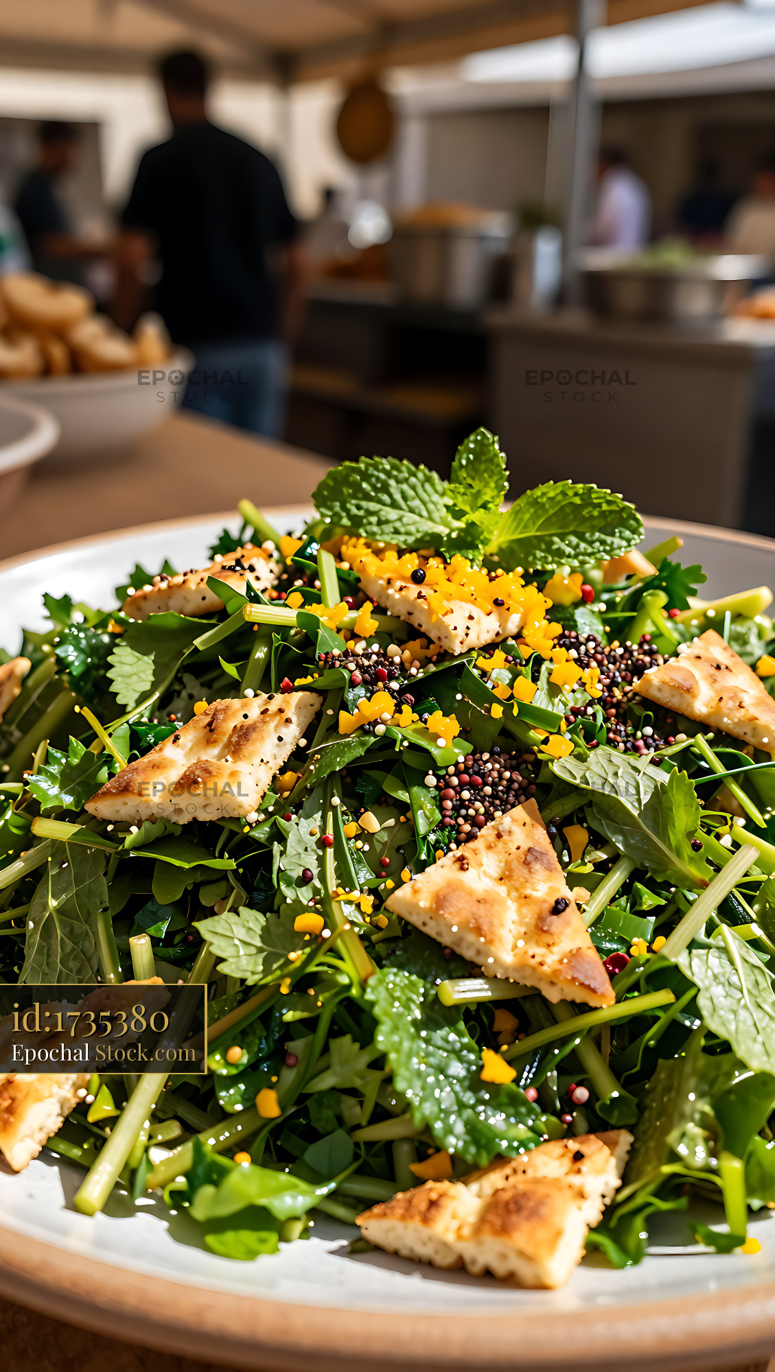 Fresh Lebanese fattoush salad with crispy pita and sumac - stock photo