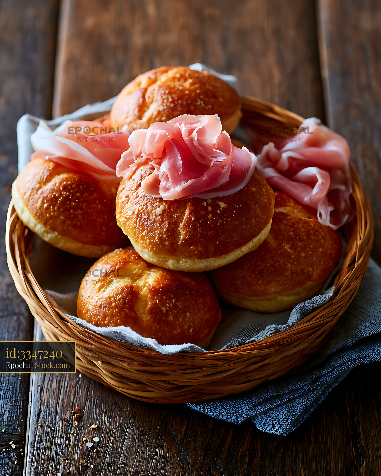 Traditional tigella modenese small rolls topped with prosciutto crudo - stock photo