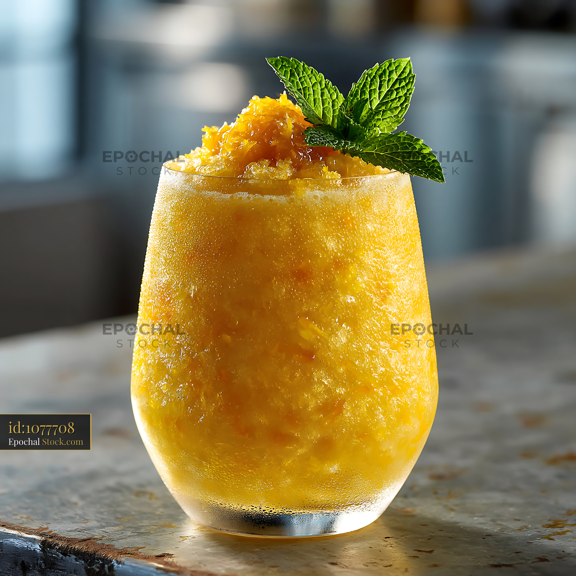 Refreshing yuja citron smoothie in a frosted glass with mint garnish - stock photo