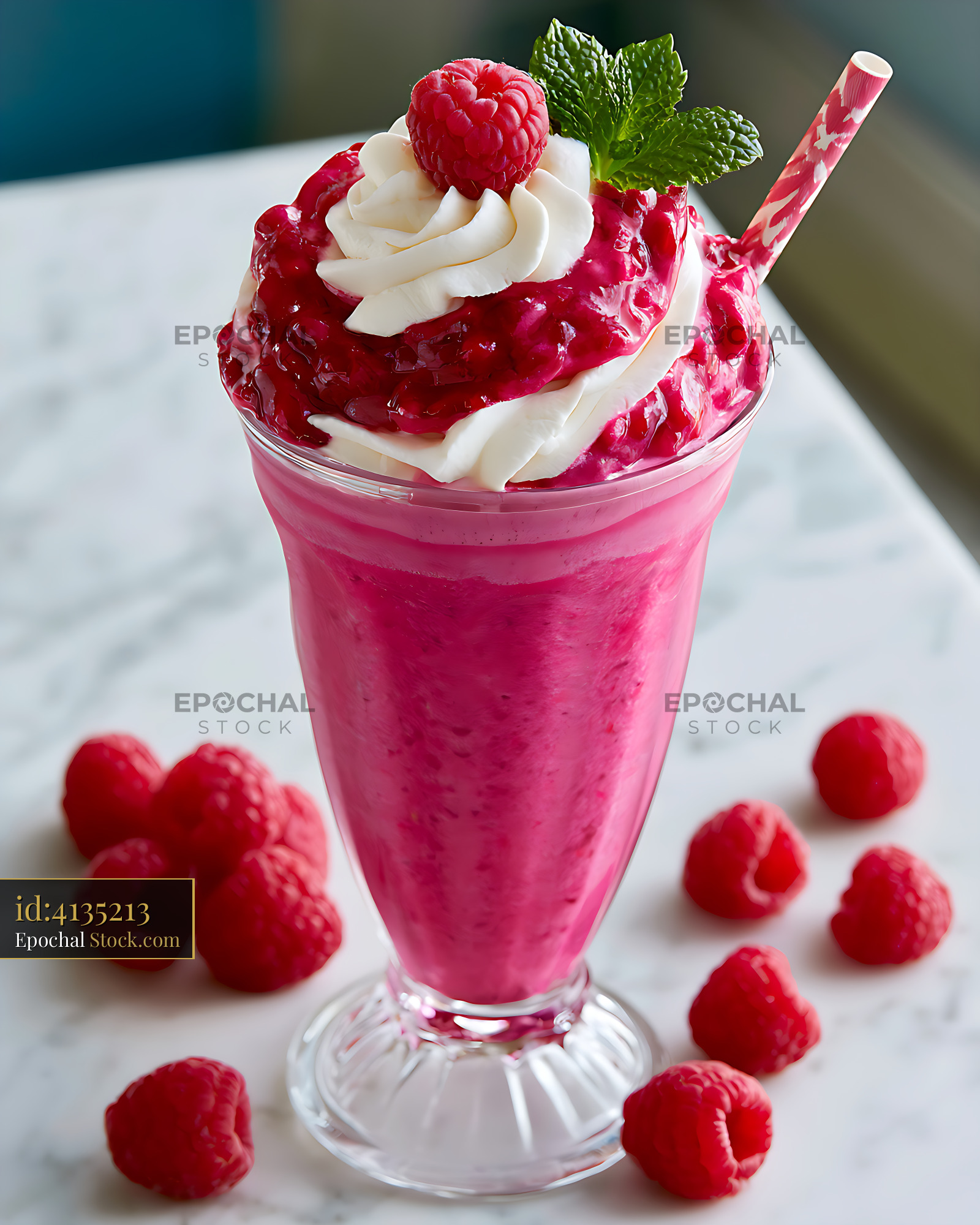 Loganberry milkshake with whipped cream and fresh berries on marble - stock photo