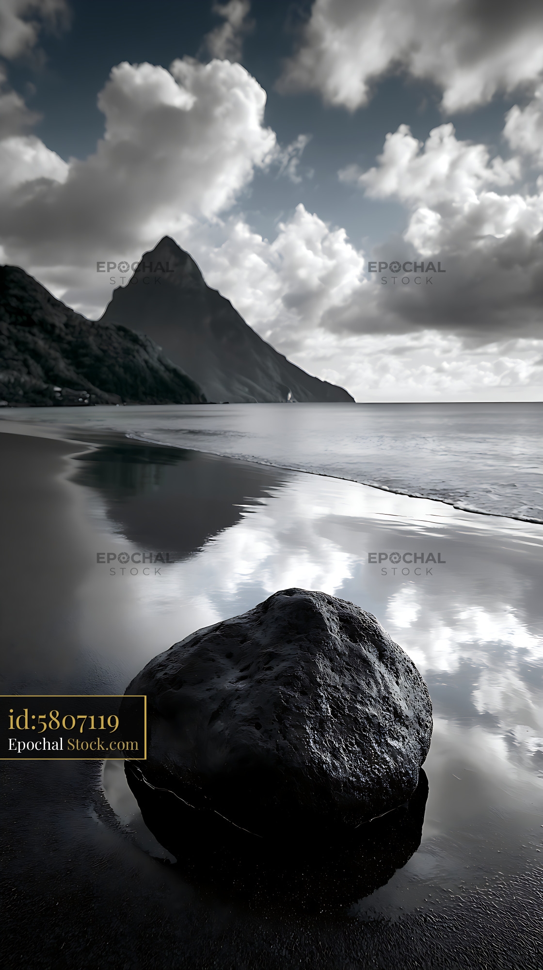 Volcanic rock on a black sand shore with Piton mountain reflection - stock photo