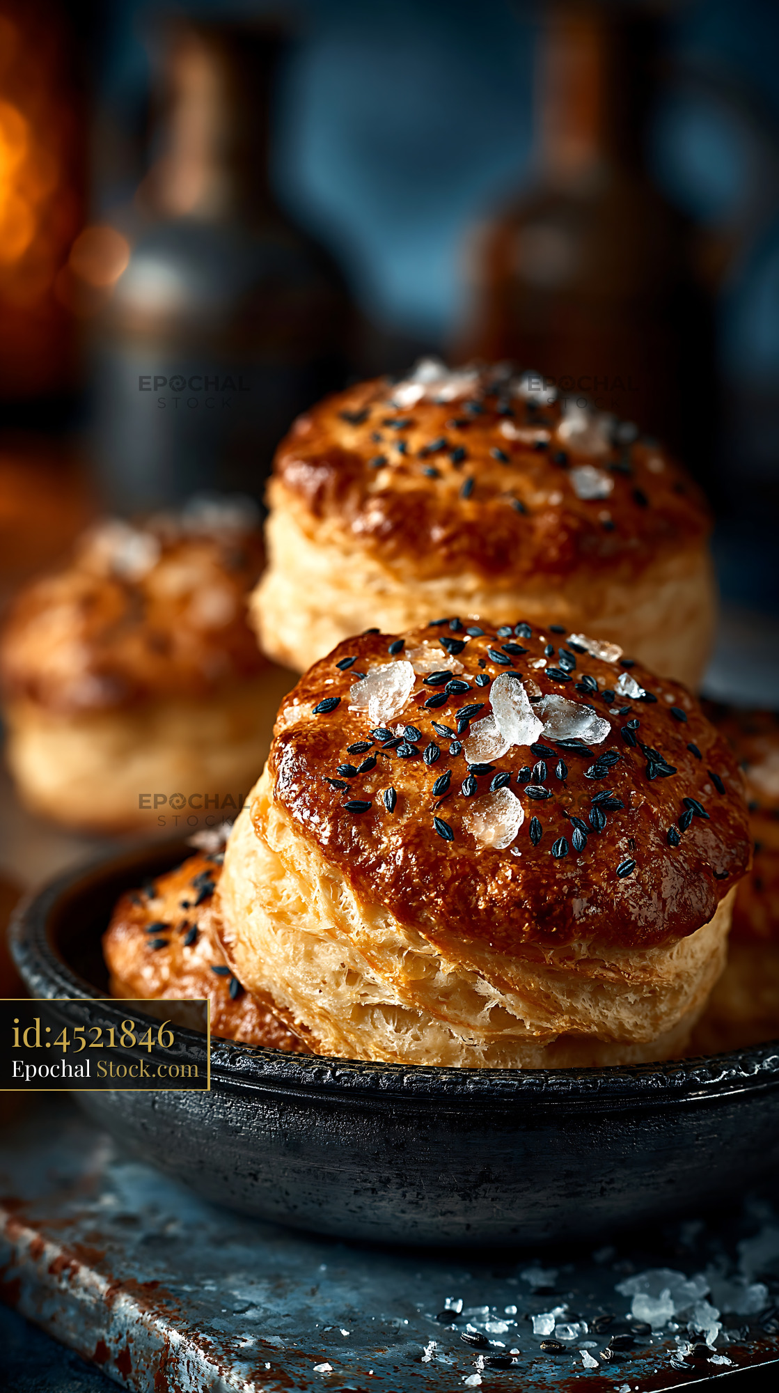Golden savory caraway seed biscuits topped with sea salt and nigella - stock photo