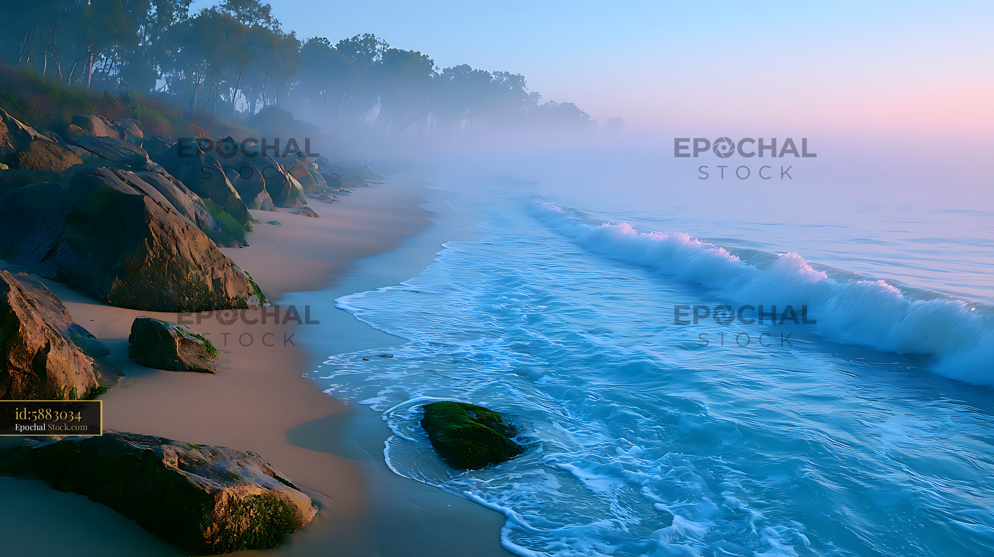 Misty coastline with gentle waves and rocks at sunrise - stock photo