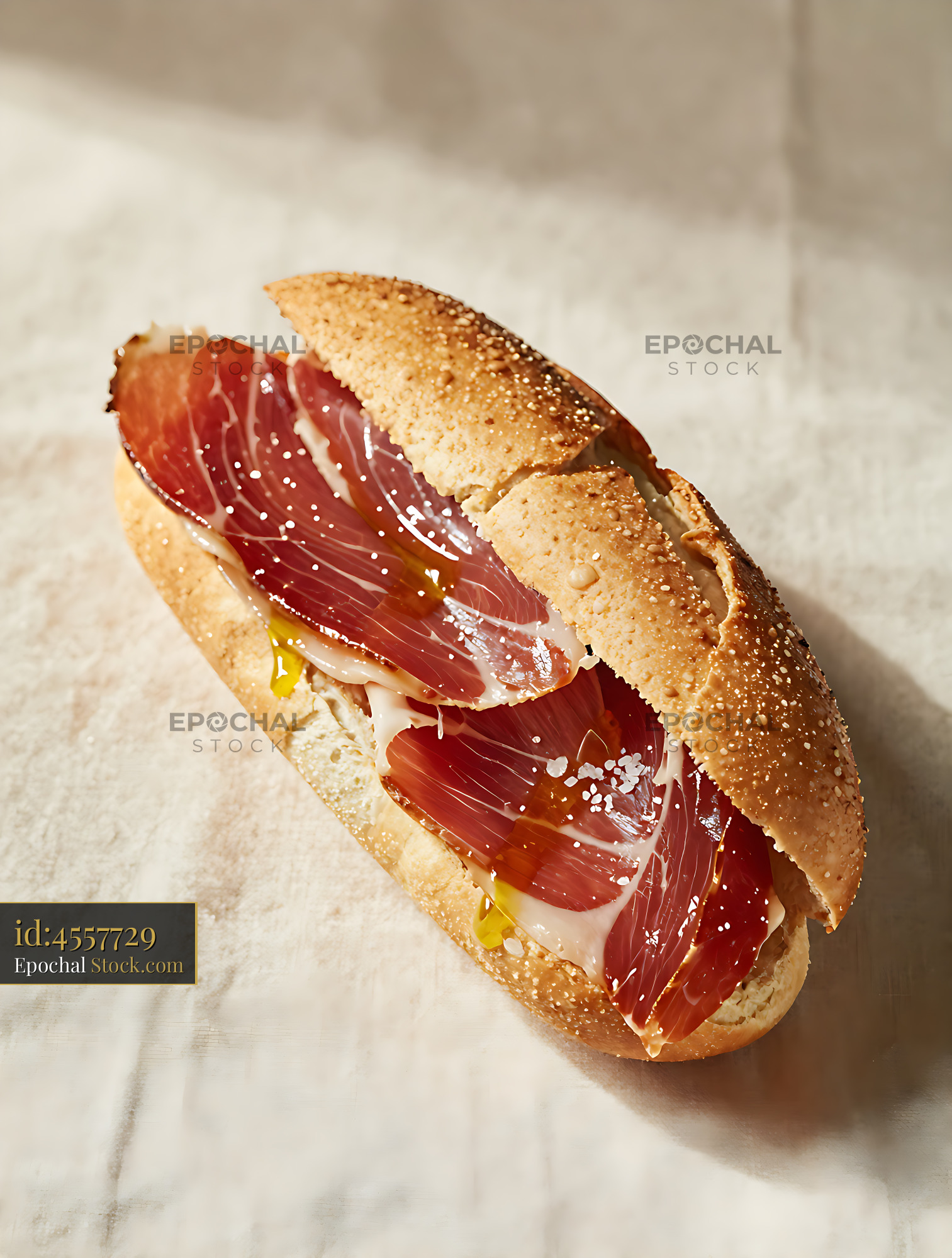 Traditional bocadillo de jamon serrano with olive oil and sea salt - stock photo
