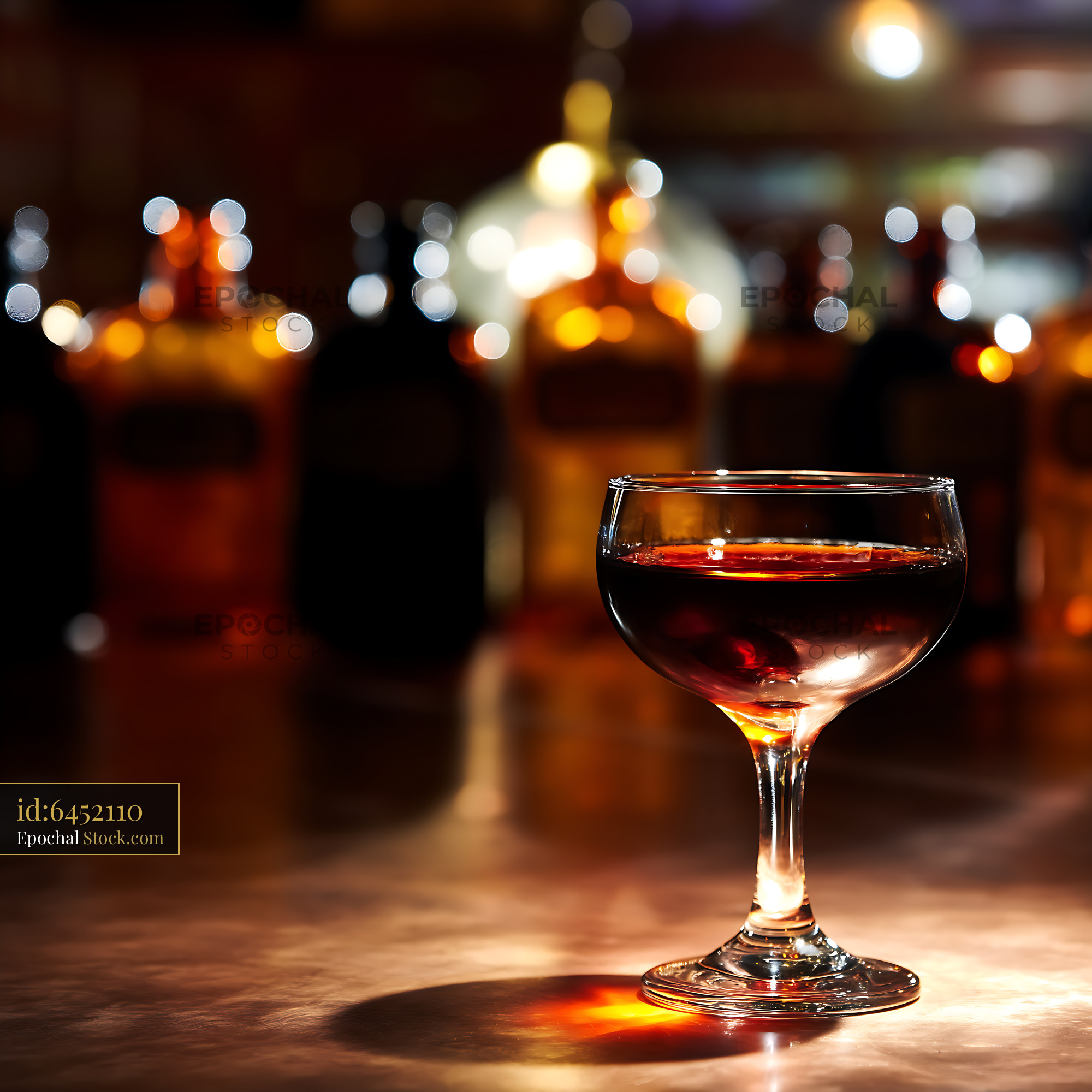 Bushwick Cocktail in Elegant Coupe Glass at Bar - stock photo