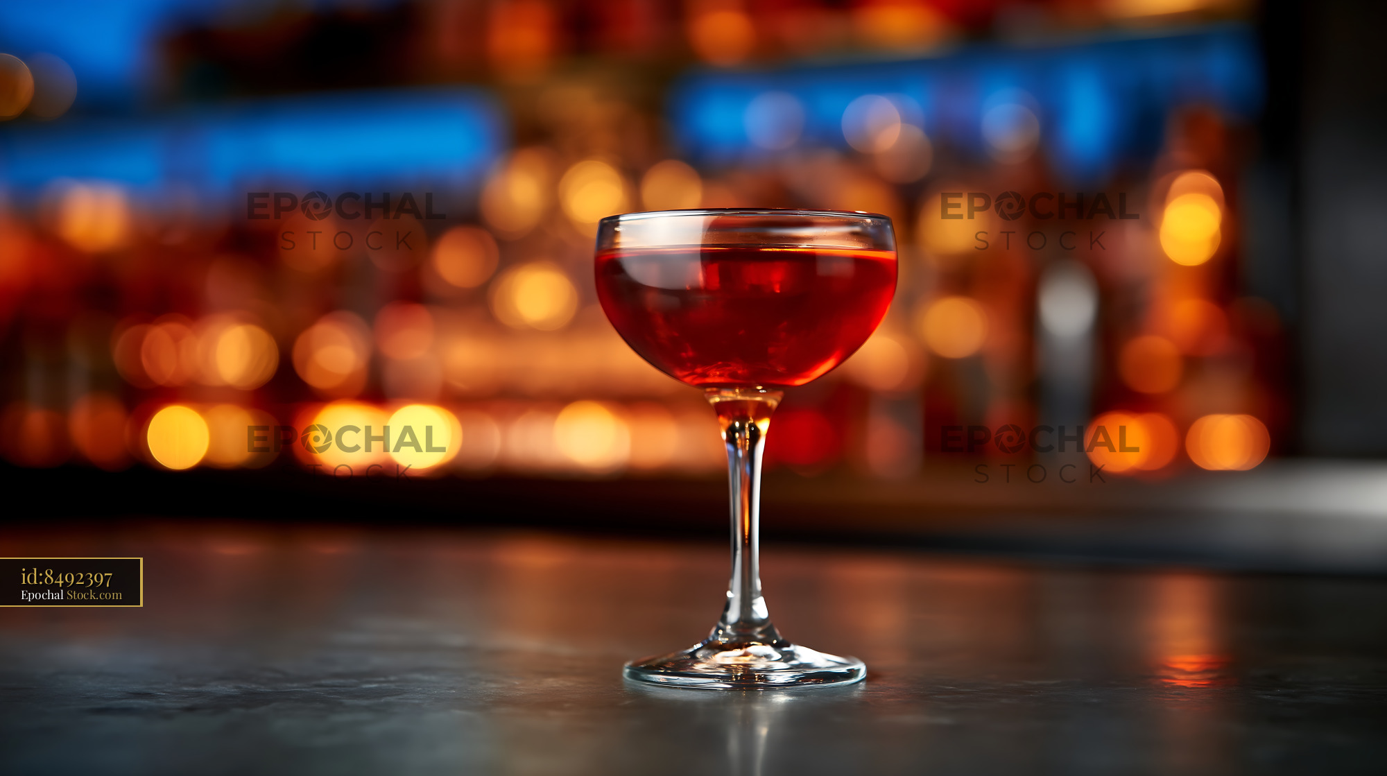 Red Cocktail at Bar with Evening Ambient - stock photo