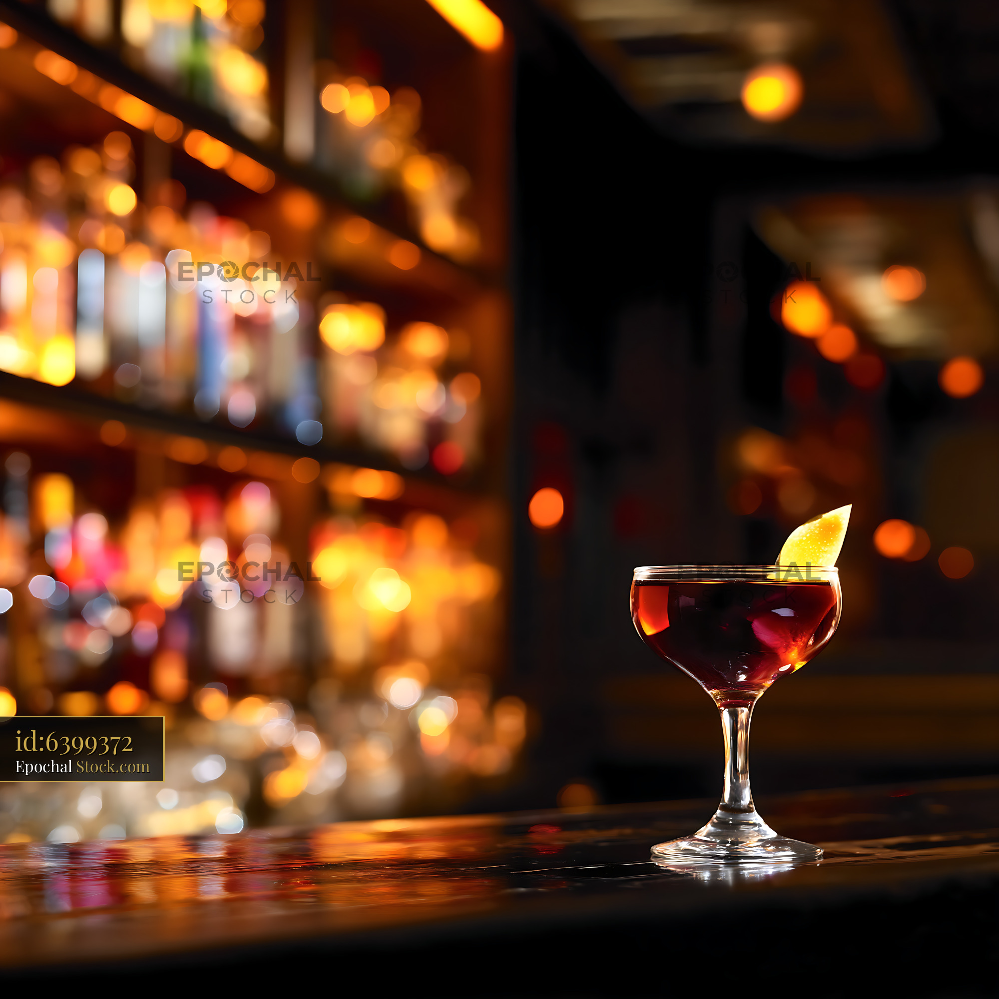 Bushwick Cocktail with Lemon Garnish at Bar - stock photo