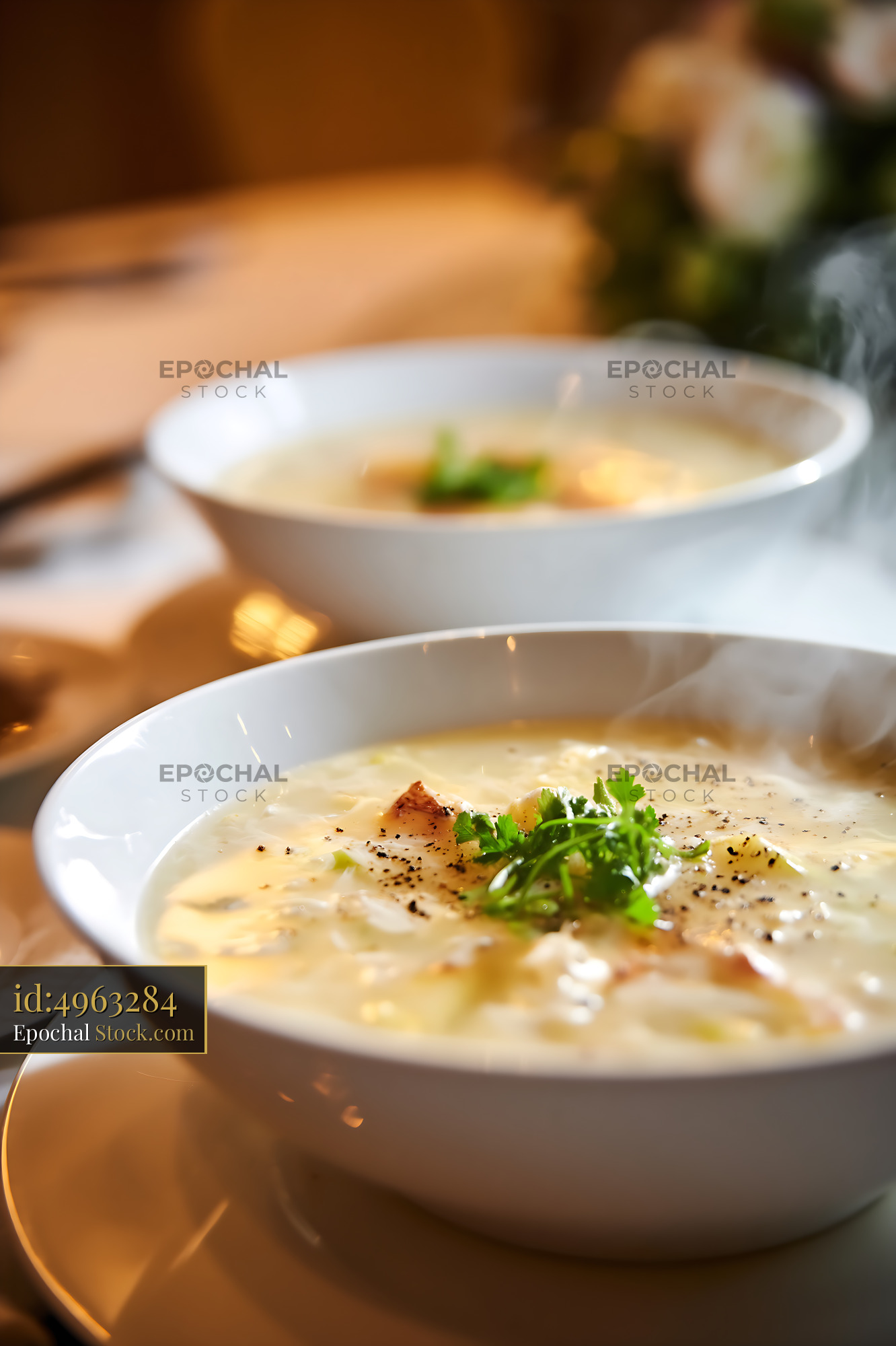 Steaming Sup Mang Cua Soup Bowls on Elegant Table - stock photo