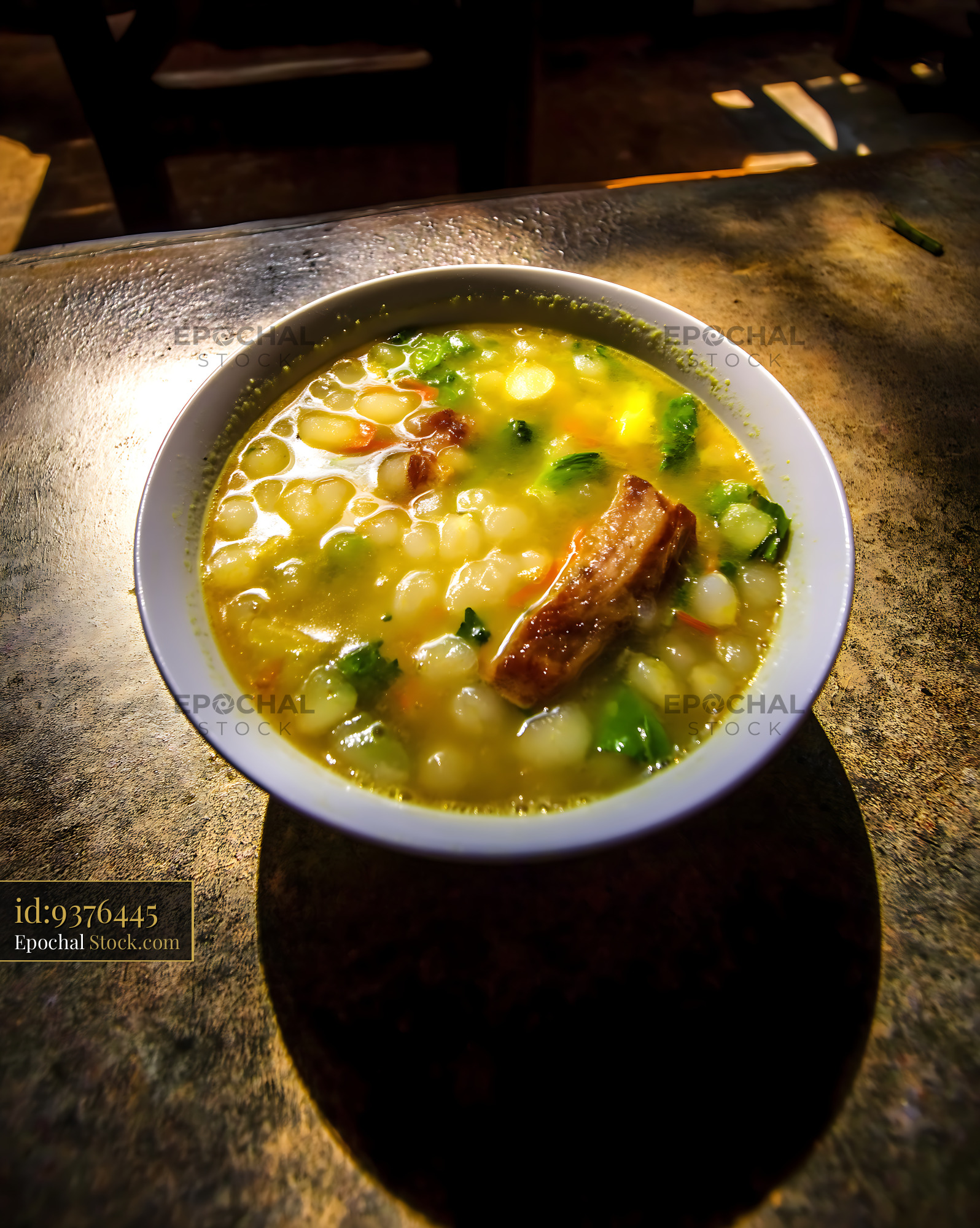 Kapurung Soup with Meat and Greens in Sunlight - stock photo